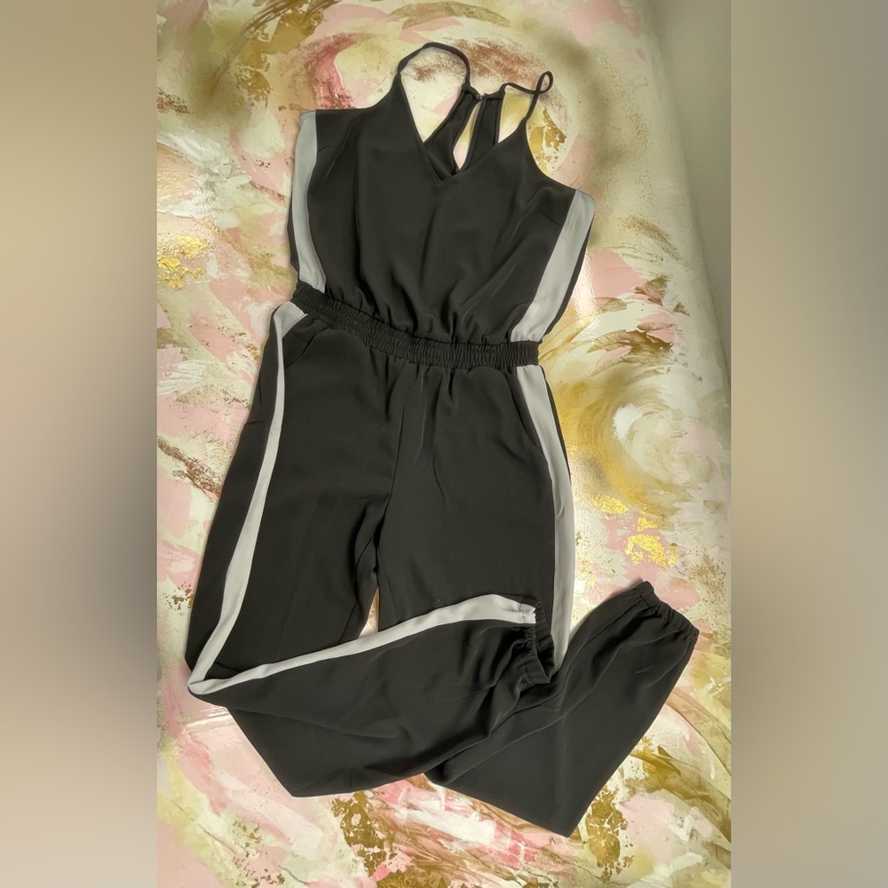 A New York black and white striped side jumping romper M